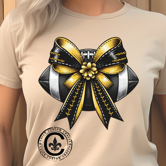 Football Bow Unisex Tee | Sporty Style Tee, Game Day T-Shirt, Casual Wear, Athletic Gift, Fan Apparel, Black and Gold, Saints