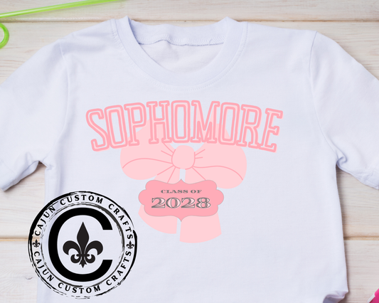 sophomore 2028 with a cute bow on a unisex tshirt, female high school