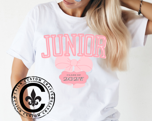 Junior 2027 with a cute bow on a unisex tshirt, female high school