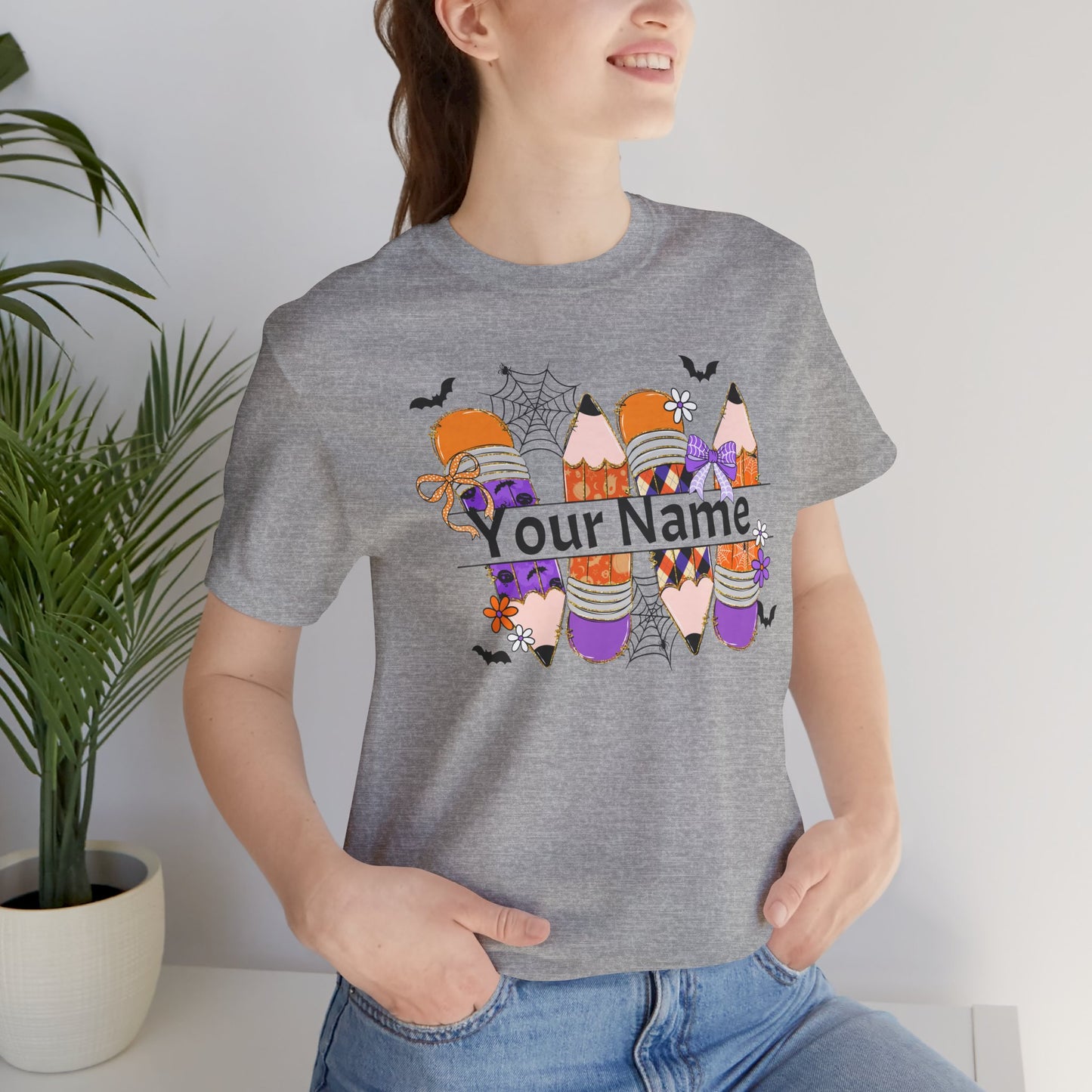 Personalized Halloween School Pencil with your name design, on a bella canvas shirt