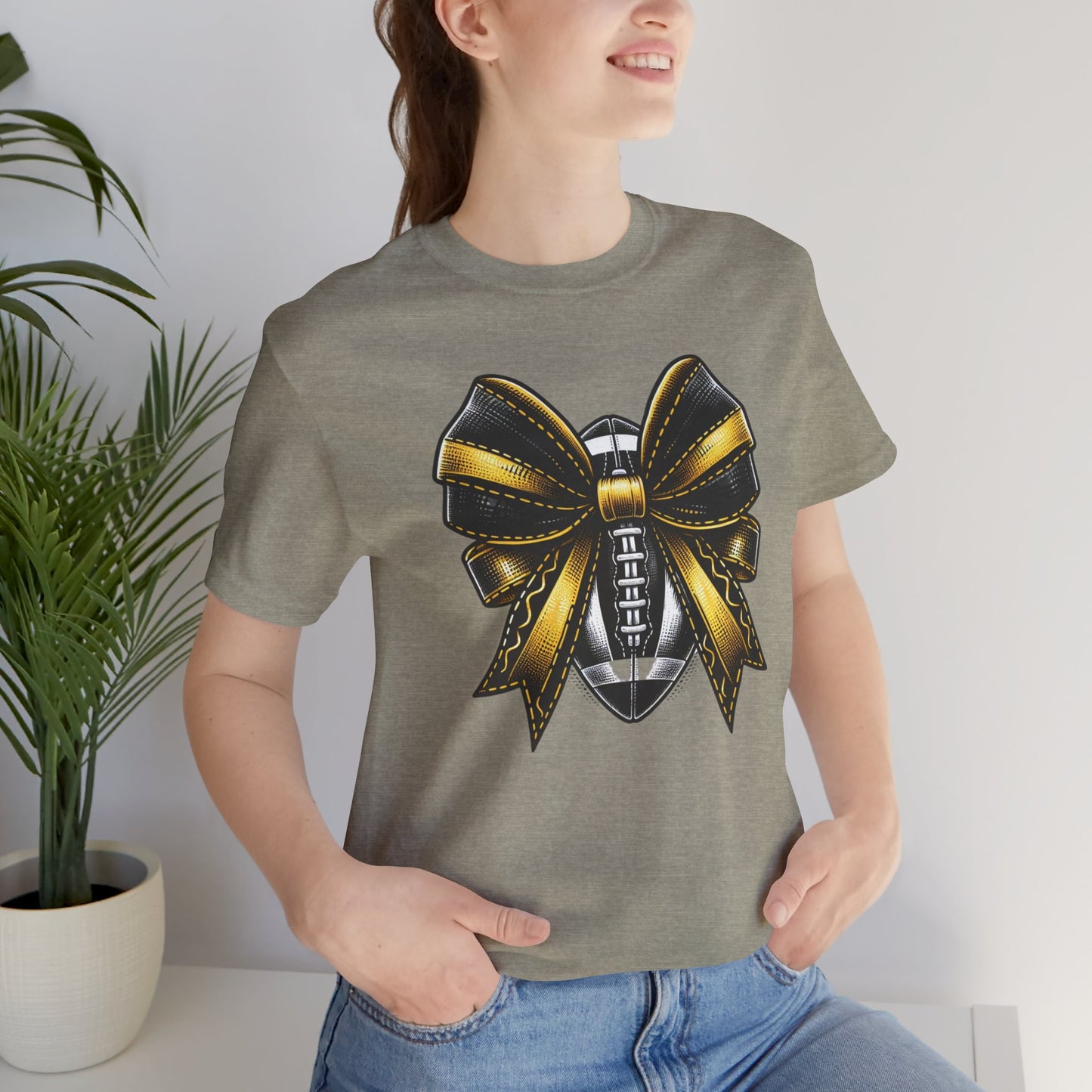 Football Bow Unisex Tee | Sporty Style Tee, Game Day T-Shirt, Casual Wear, Athletic Gift, Fan Apparel, Black and Gold, Saints