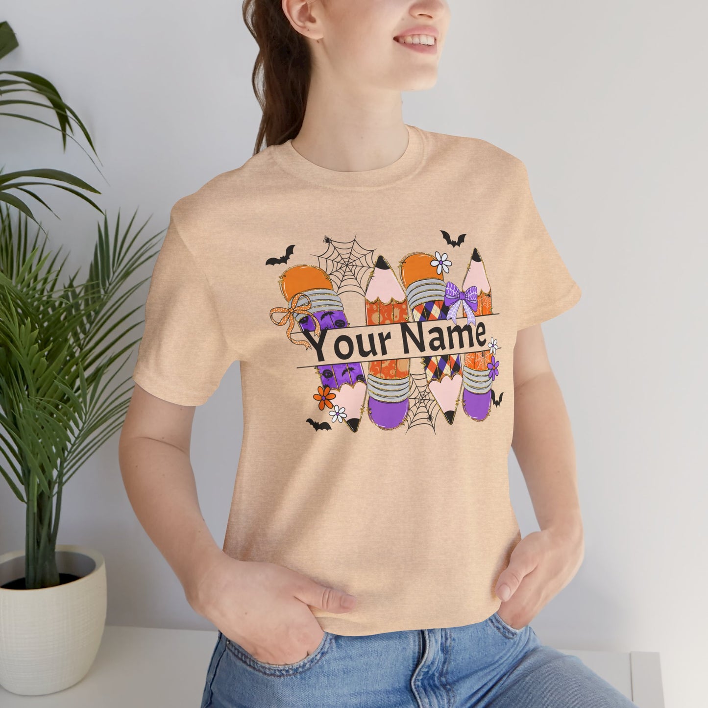 Personalized Halloween School Pencil with your name design, on a bella canvas shirt