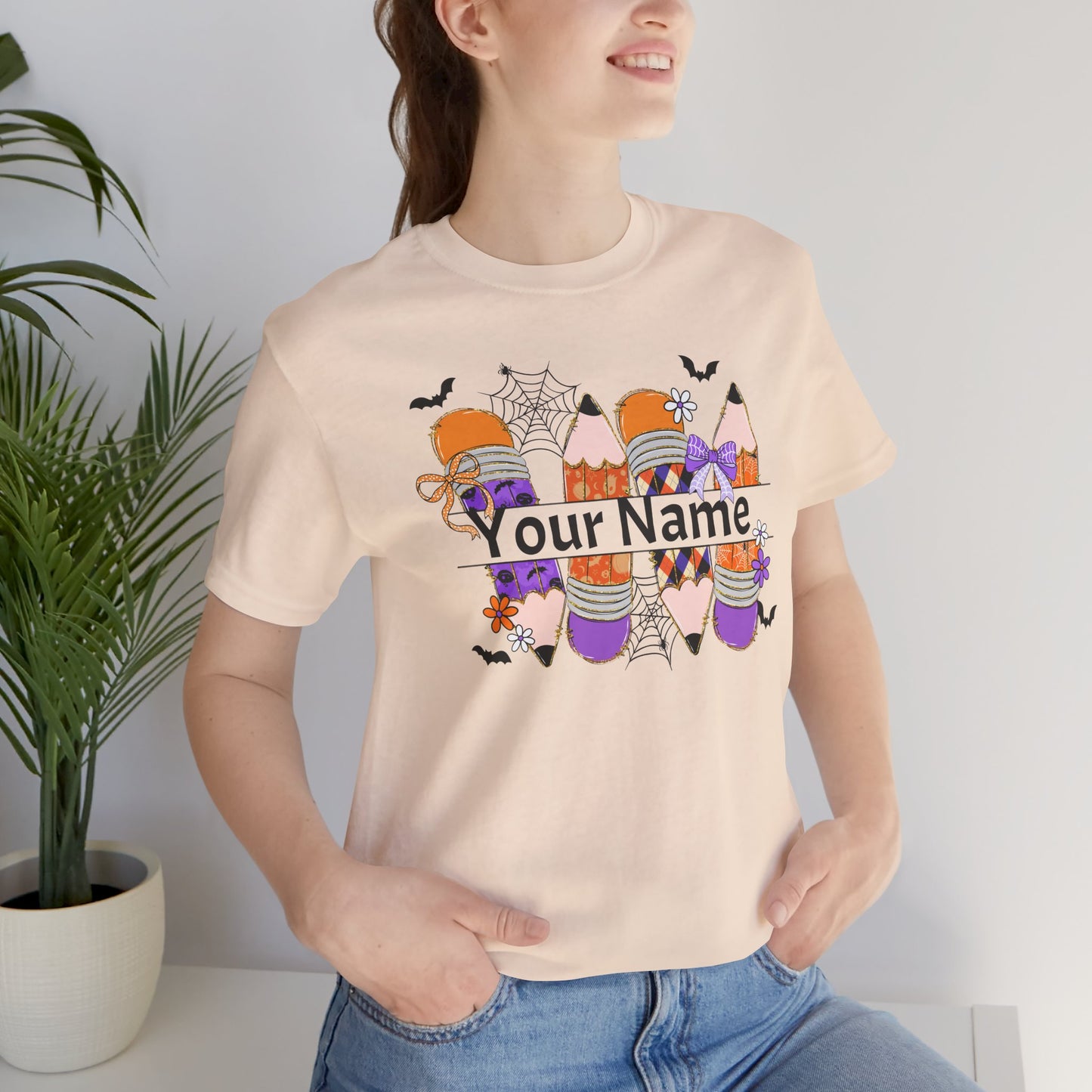 Personalized Halloween School Pencil with your name design, on a bella canvas shirt