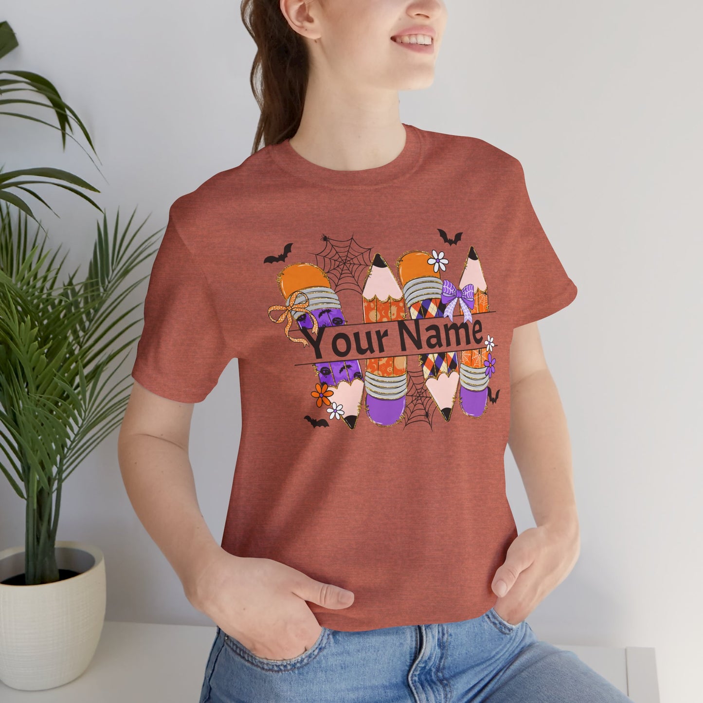 Personalized Halloween School Pencil with your name design, on a bella canvas shirt