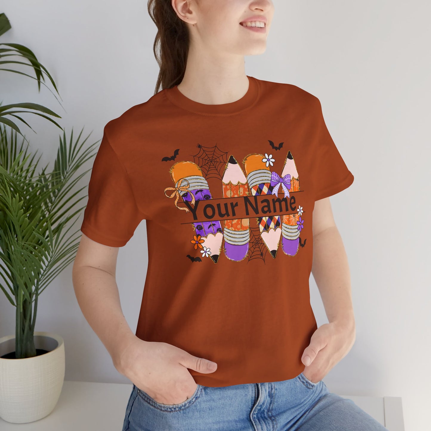 Personalized Halloween School Pencil with your name design, on a bella canvas shirt