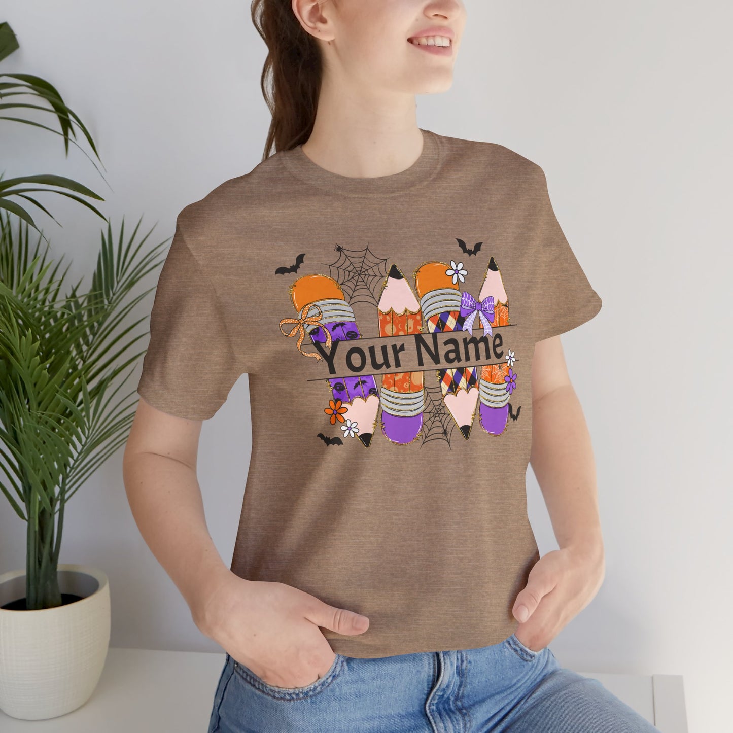 Personalized Halloween School Pencil with your name design, on a bella canvas shirt