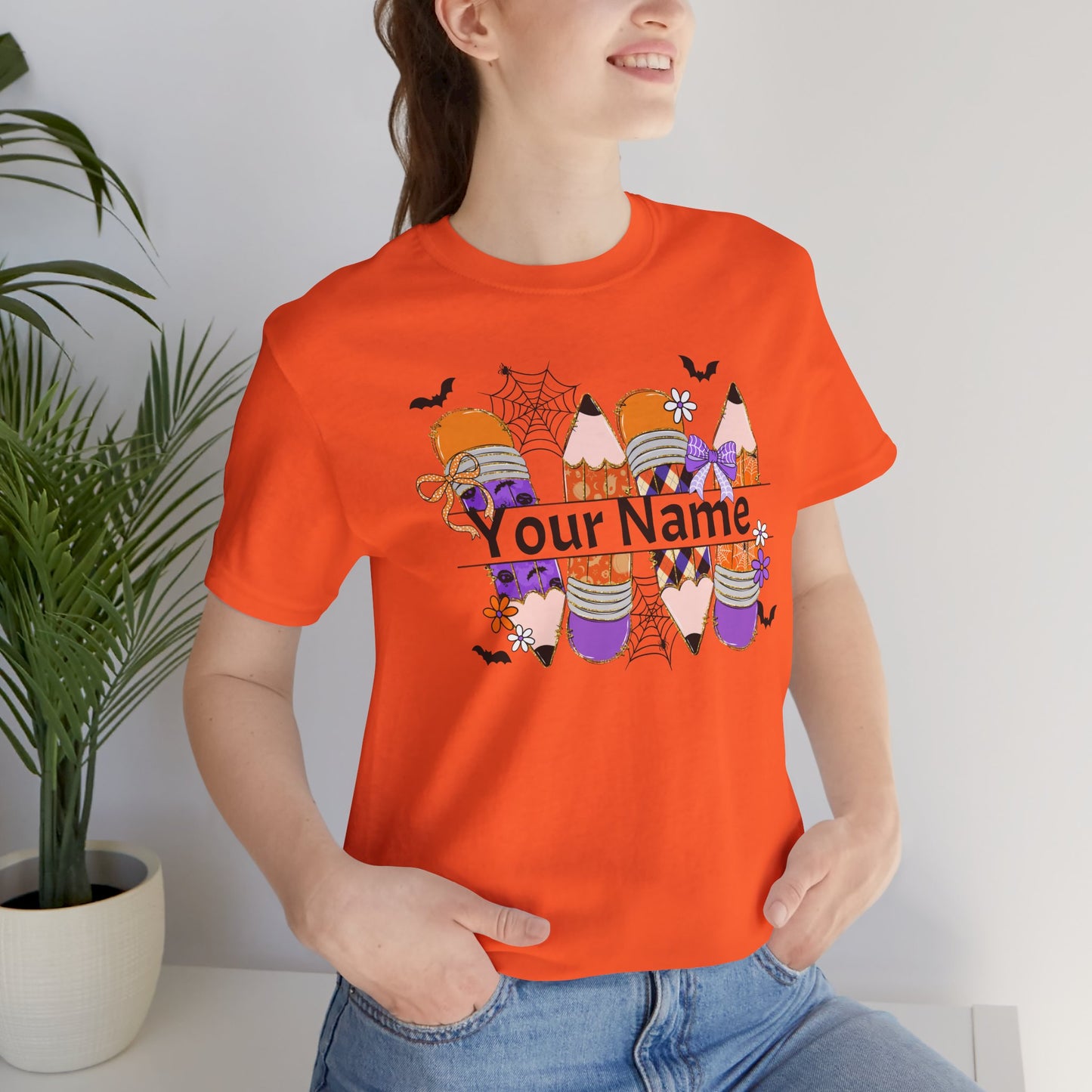 Personalized Halloween School Pencil with your name design, on a bella canvas shirt